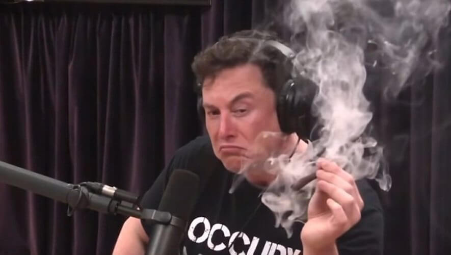 Elon Musk smoking a blunt