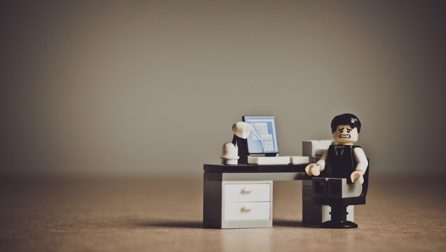 LEGO businessman at a desk